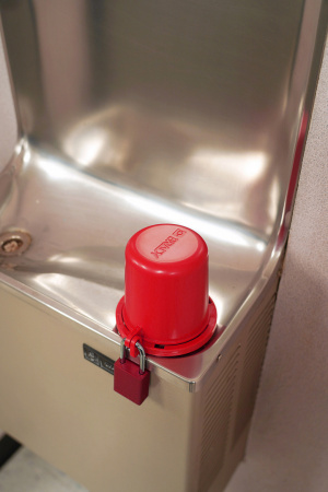 Блокиратор вентилей со съемной рукоятью